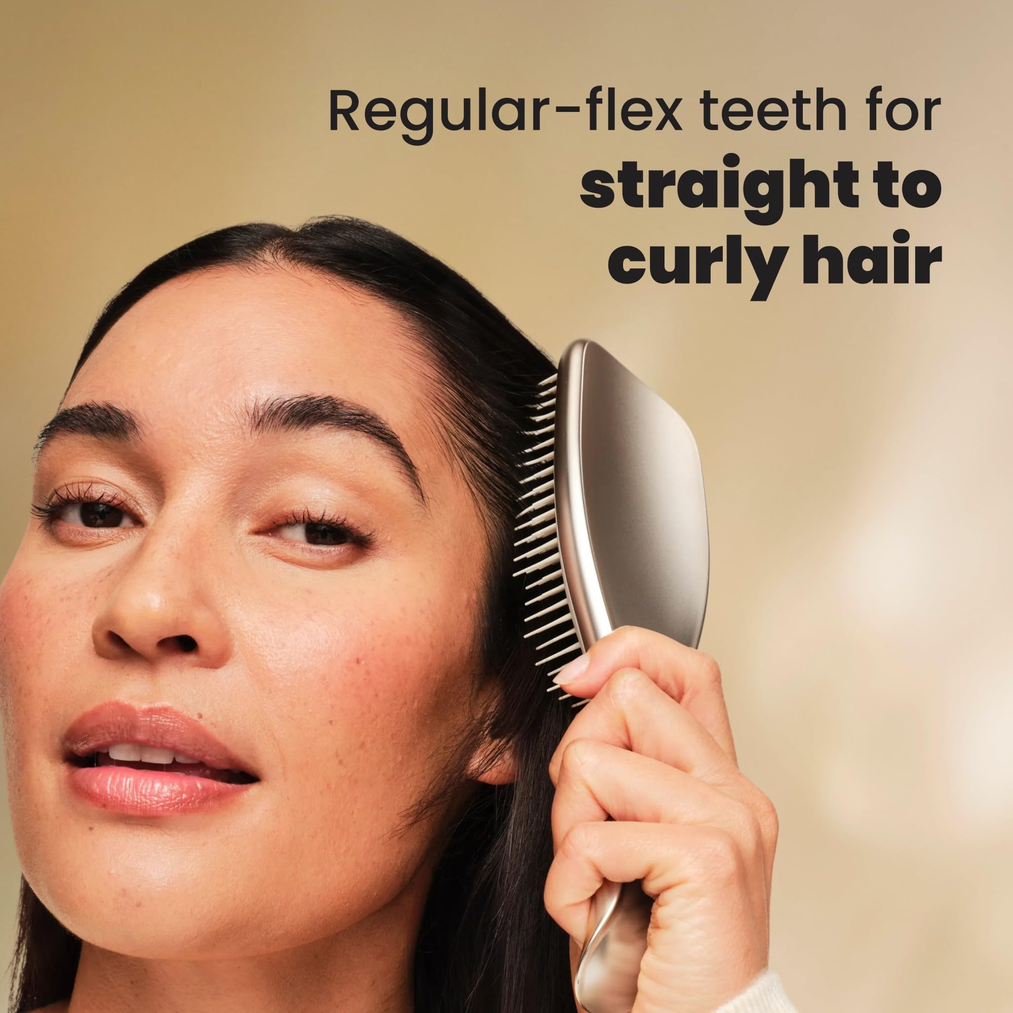 Tangle Teezer Chrome Ultimate Detangler in shower demonstrates even conditioner distribution.