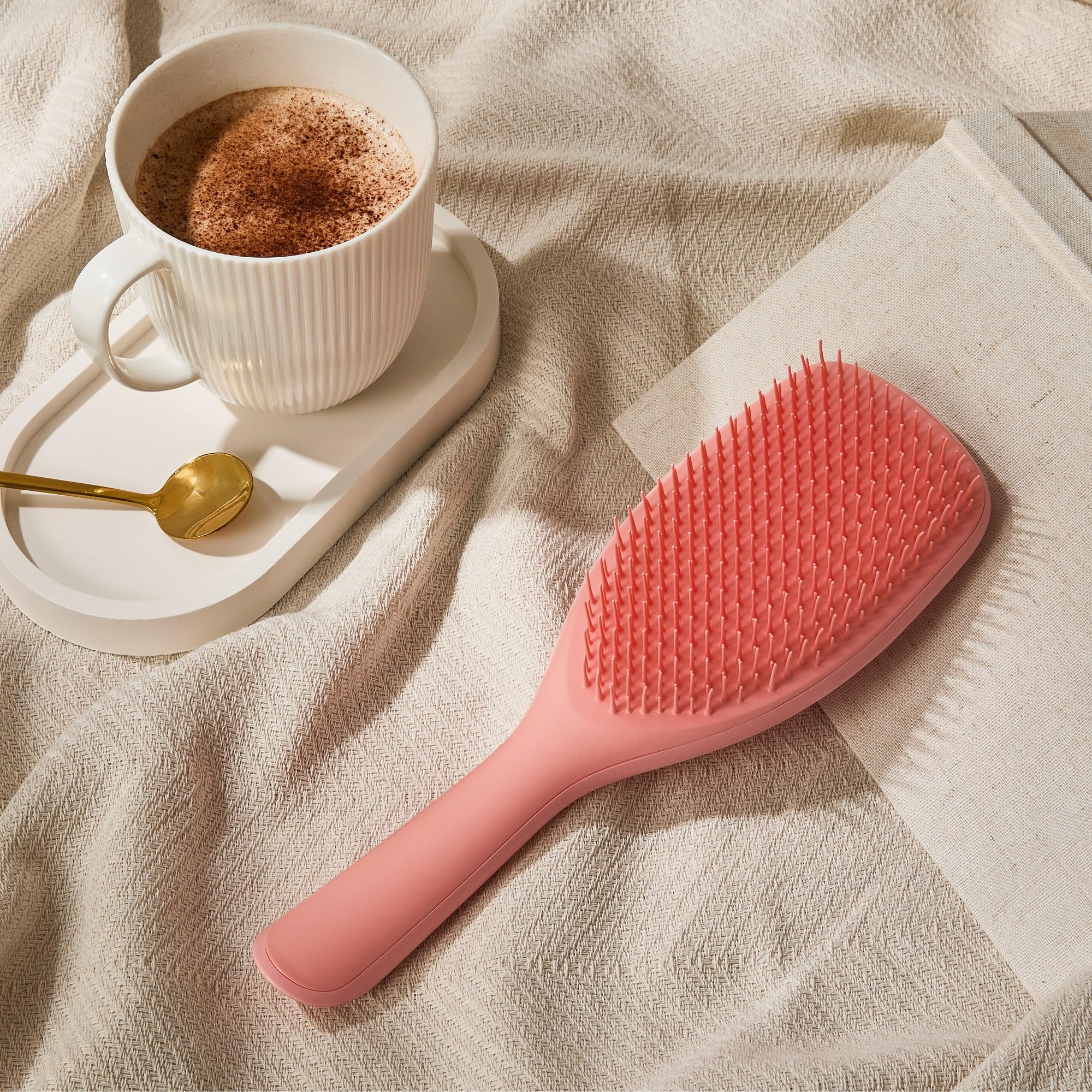 Tangle Teezer Large Ultimate Detangler Hairbrush in shower for even product distribution.