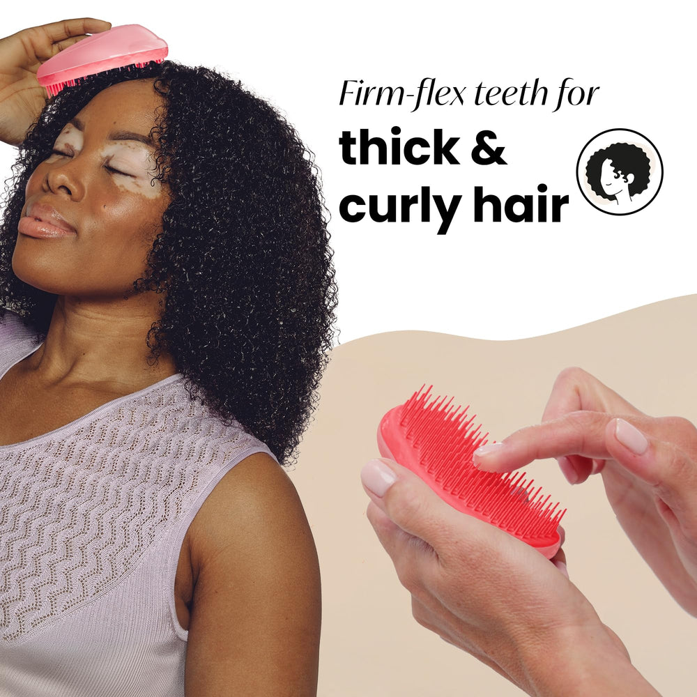 Thick curly hair with Tangle Teezer detangler, showcasing firm-flex teeth for easy detangling.