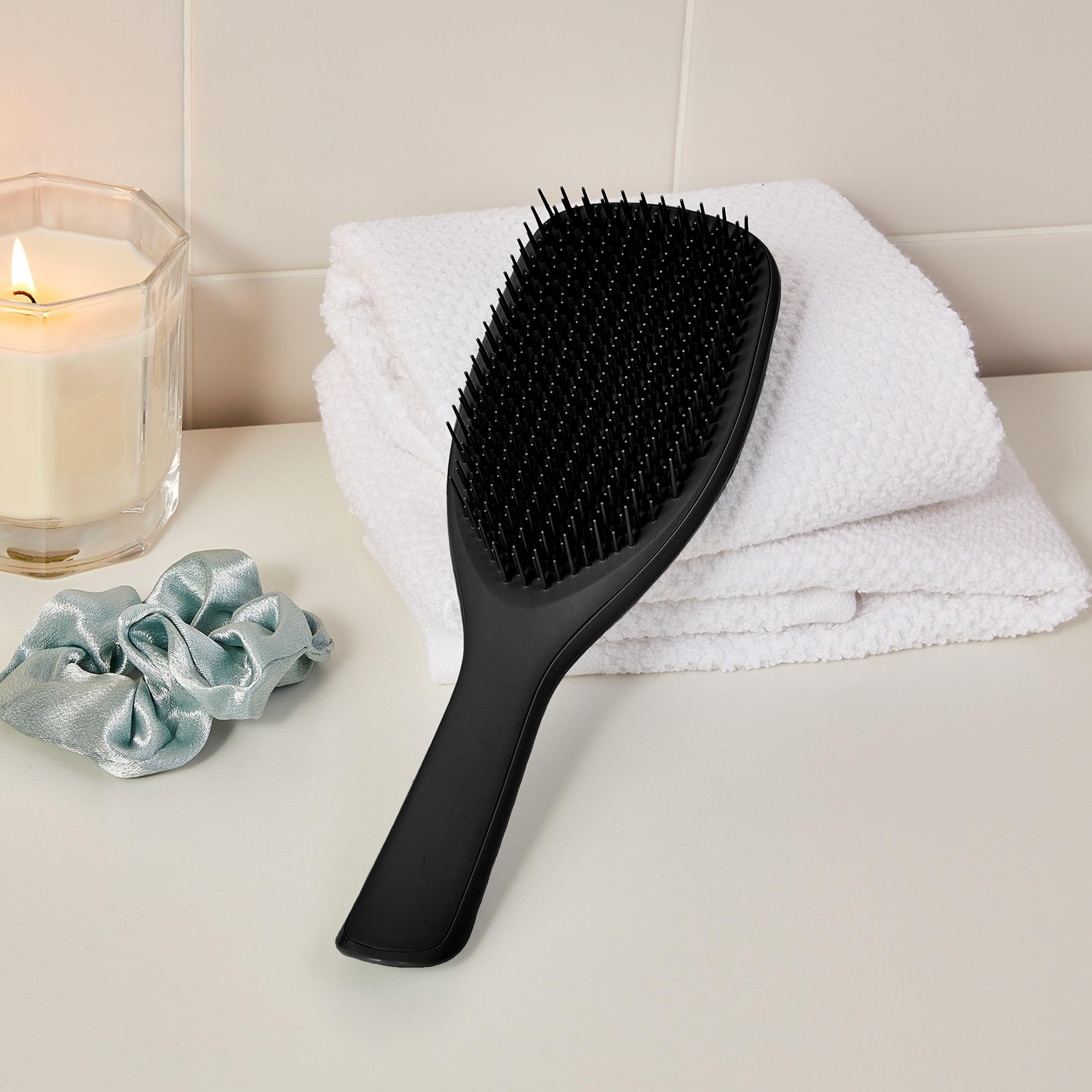Packaging transition highlighting sustainable materials for the Tangle Teezer detangler