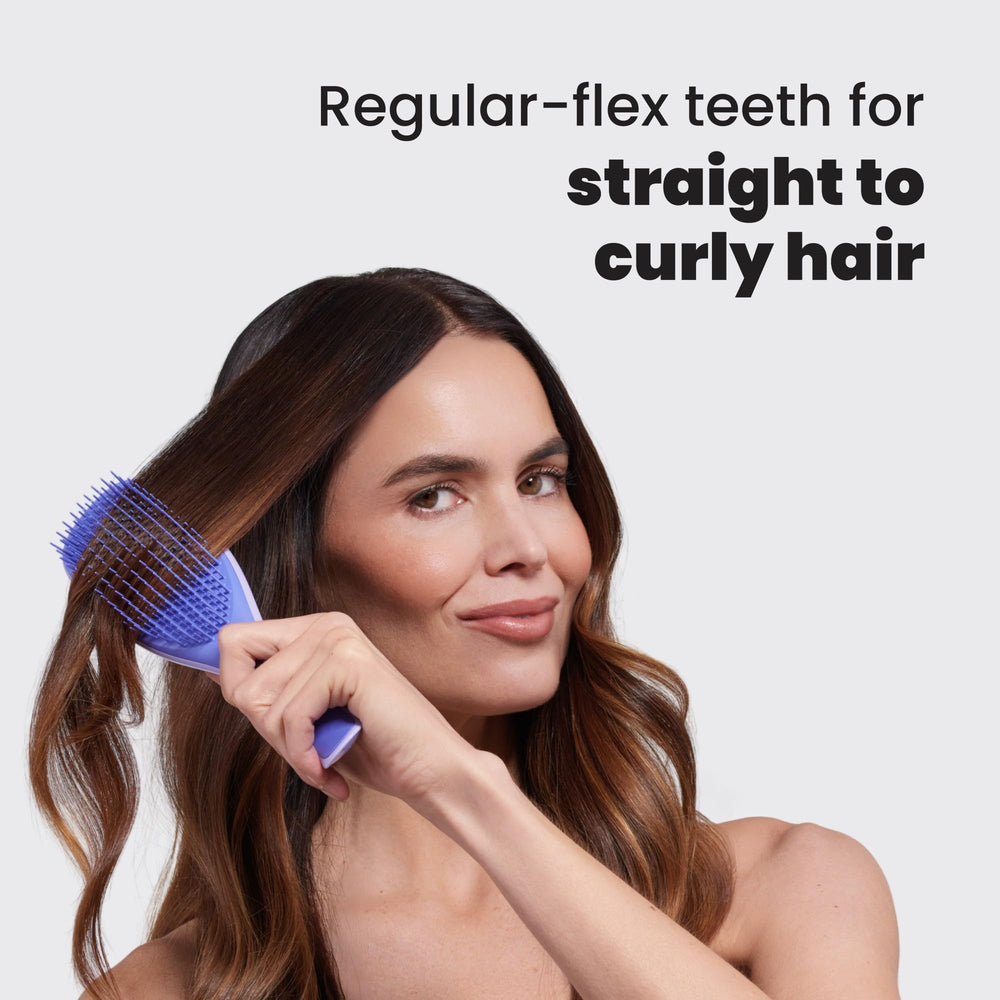 Tangle Teezer shower brush distributes conditioner evenly for smoother strands.