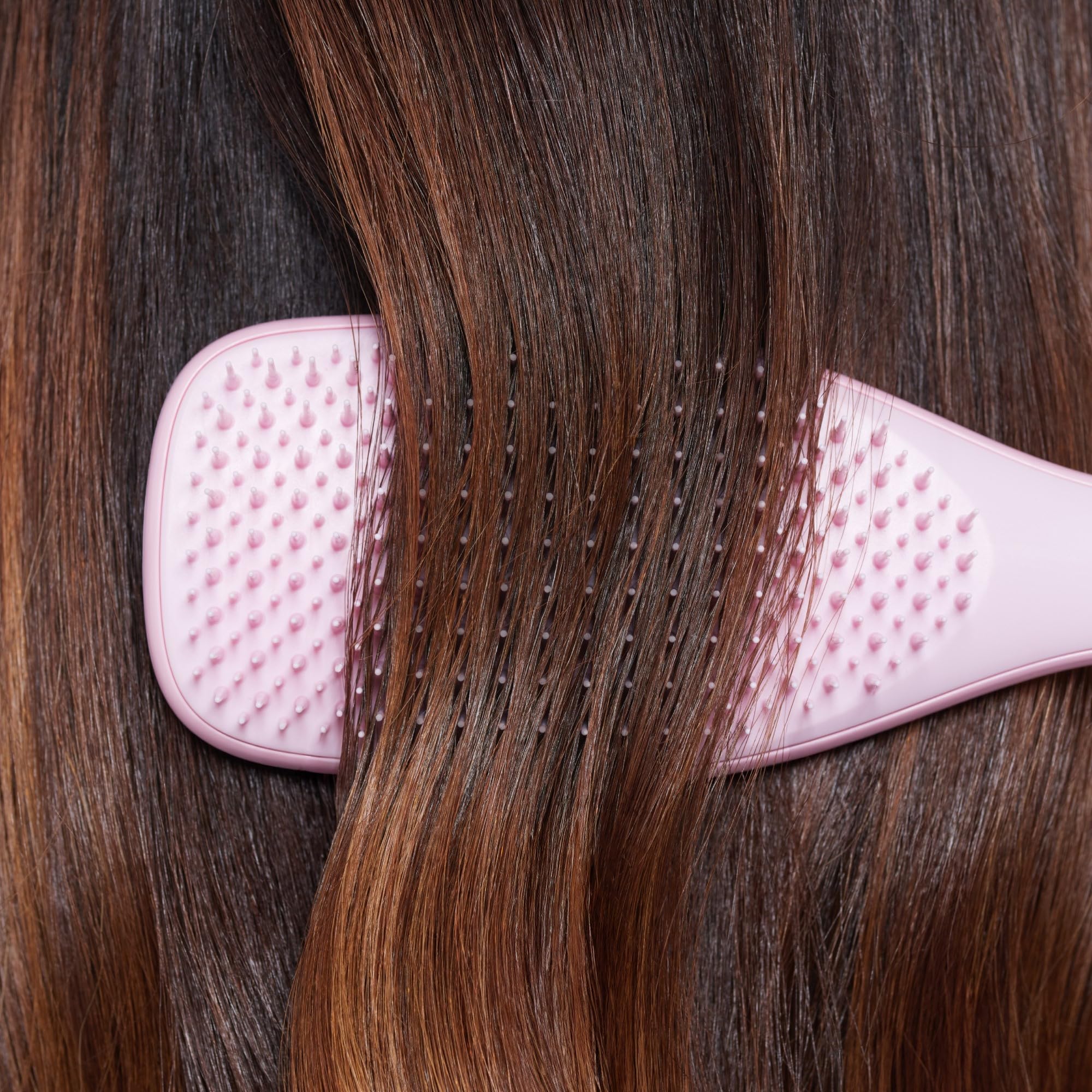 Tangle Teezer Ultimate Detangler Brush close-up reveals efficient two-tier teeth for detangling