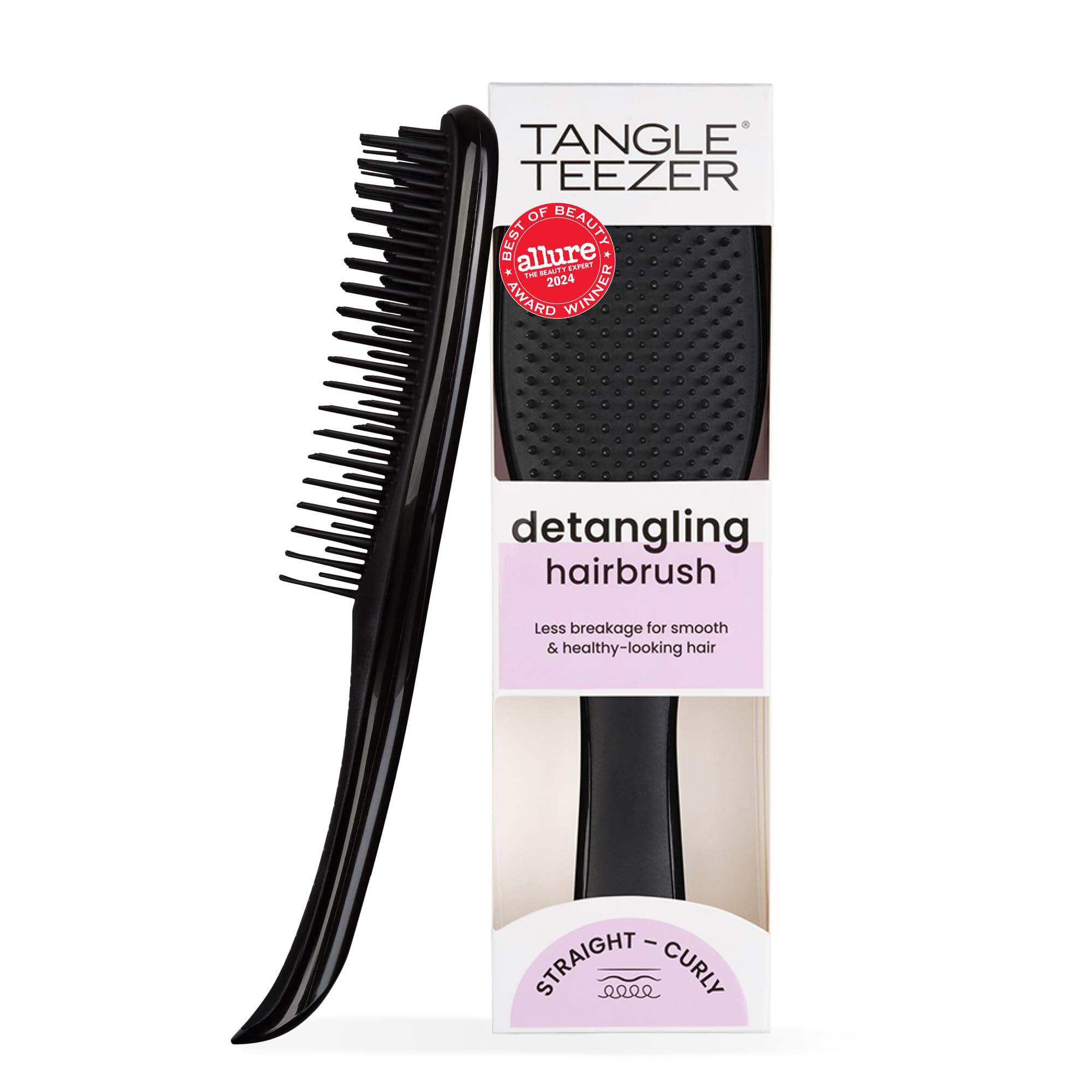 Tangle Teezer Ultimate Detangler brush on wet hair for knot-free detangling.