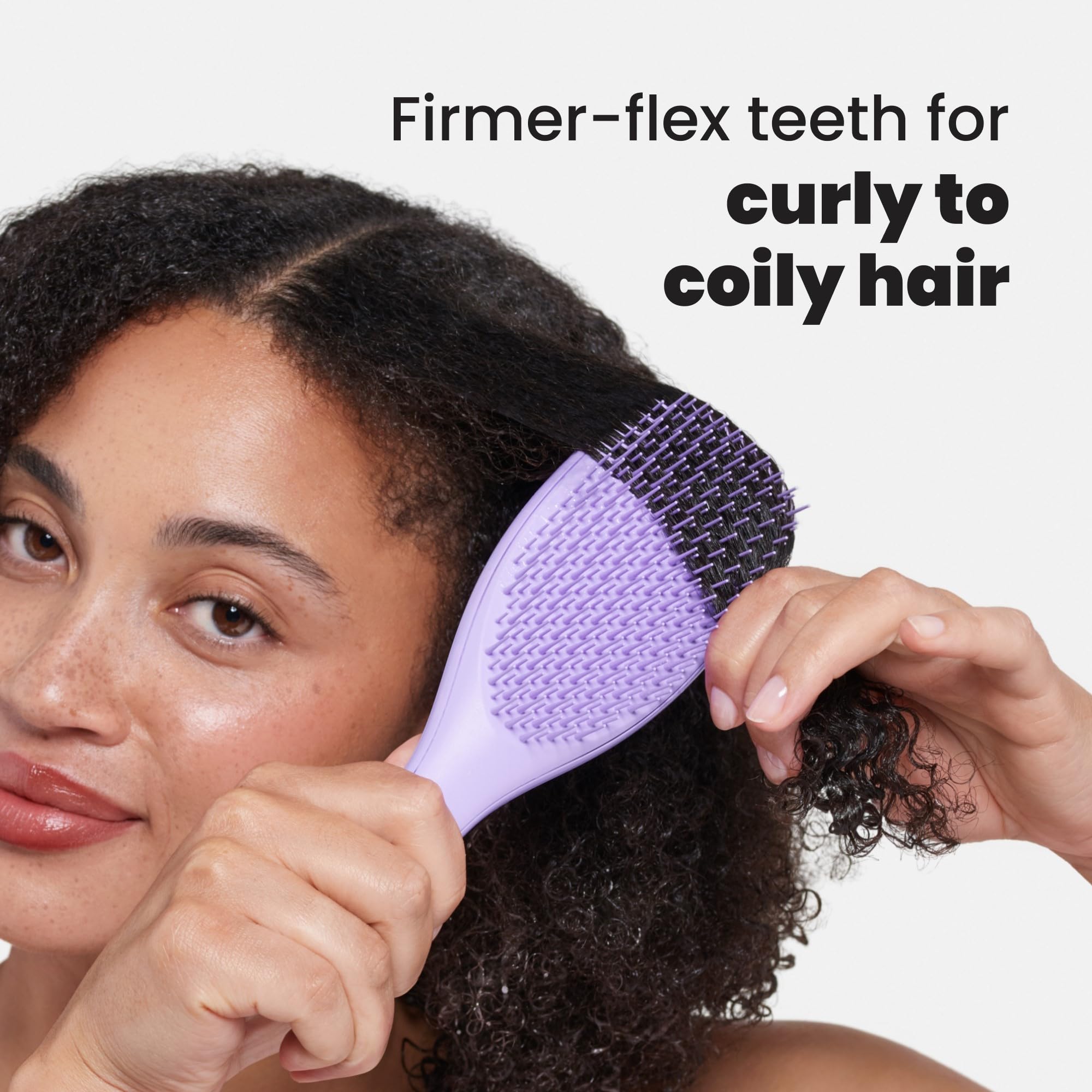 Tangle Teezer Ultimate Detangler distributing conditioner evenly in shower