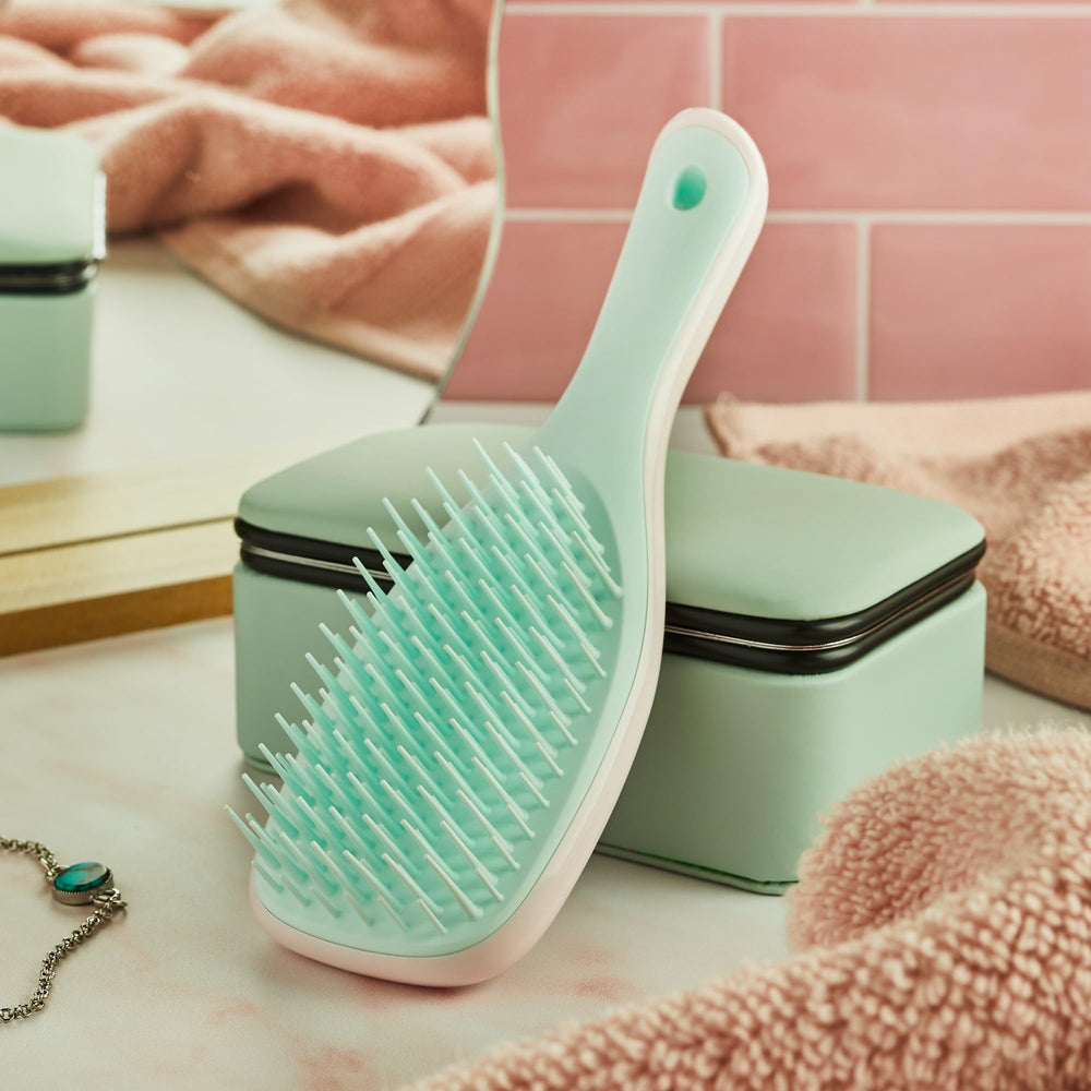 Tangle Teezer Ultimate Detangler after use delivering smooth, frizz-free hair.