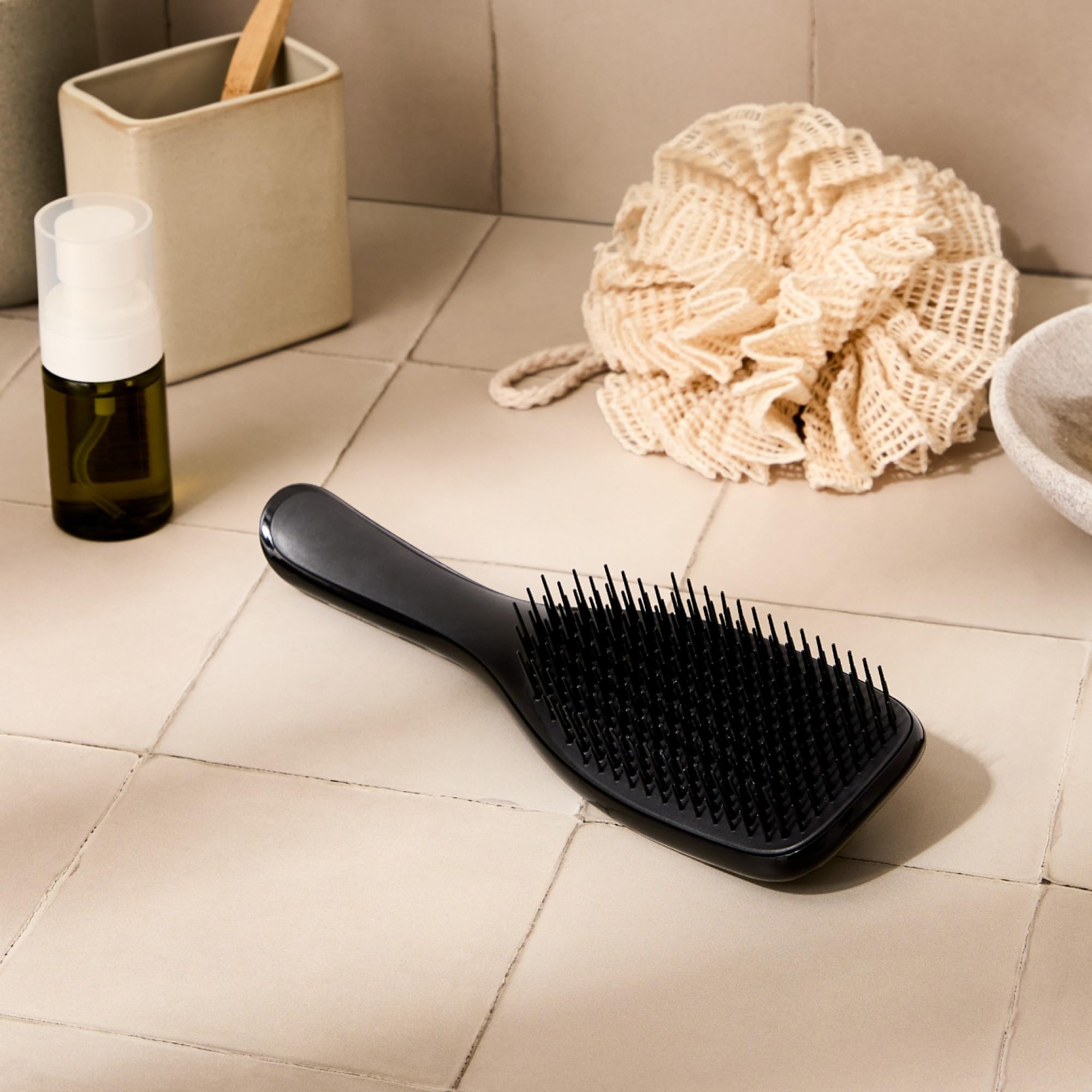 Tangle Teezer Ultimate Detangler used on wet and dry hair for versatility.
