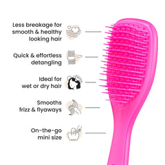 Person detangling wet hair with the Tangle Teezer to reduce tugging.