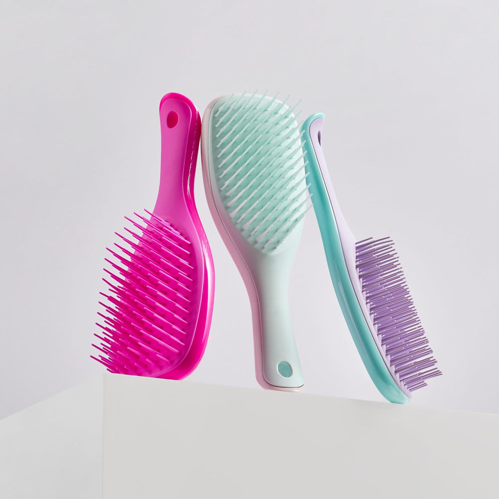 Tangle Teezer ultimate detangler travel-ready design for on-the-go styling.
