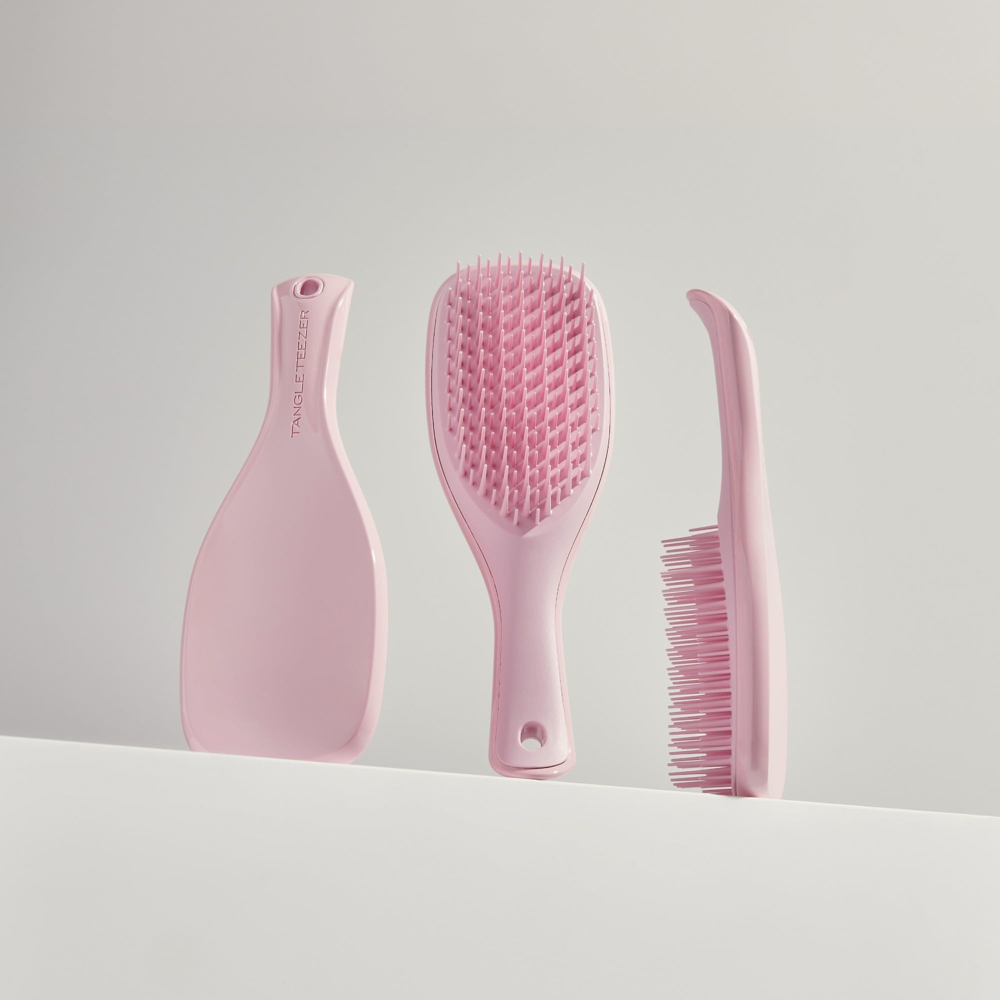 Tangle Teezer Ultimate Detangler fits in purse or gym bag for quick touch-ups