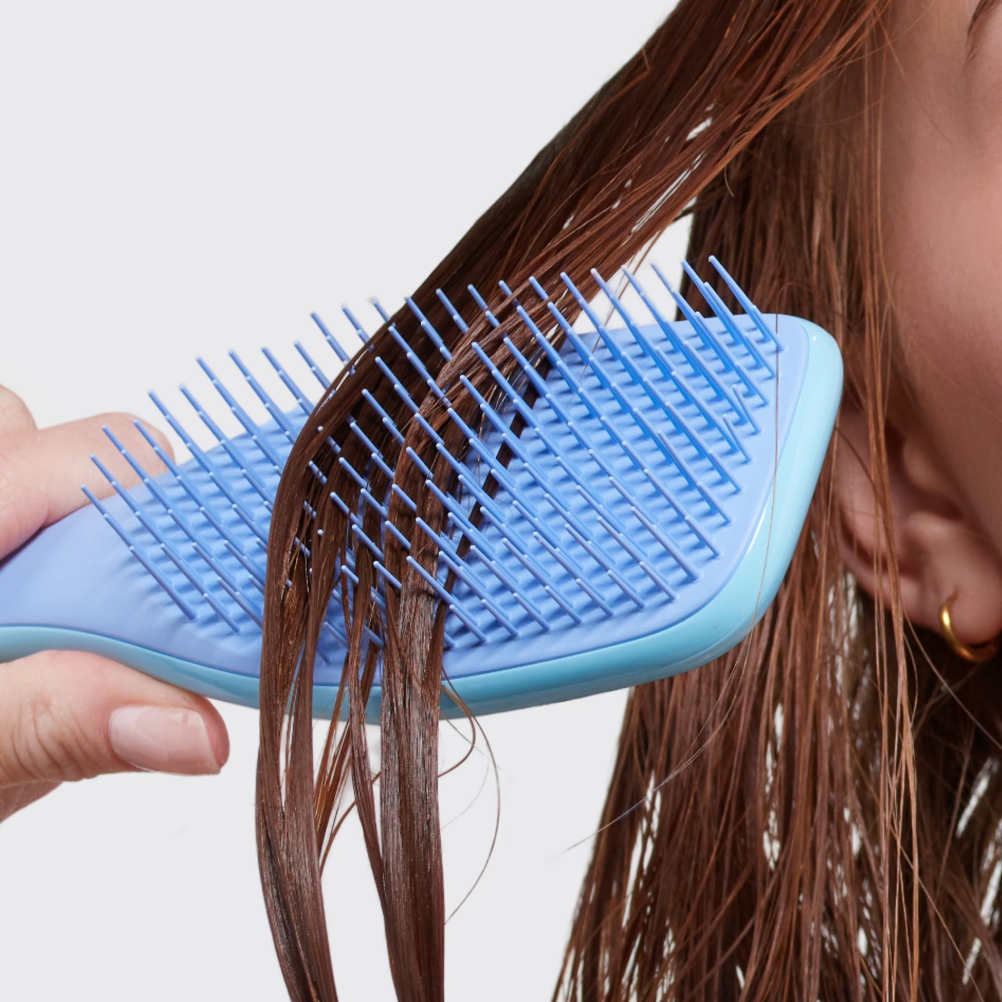 Tangle Teezer Ultimate Detangler sustainable-packaging-transition showcases eco-friendly packaging