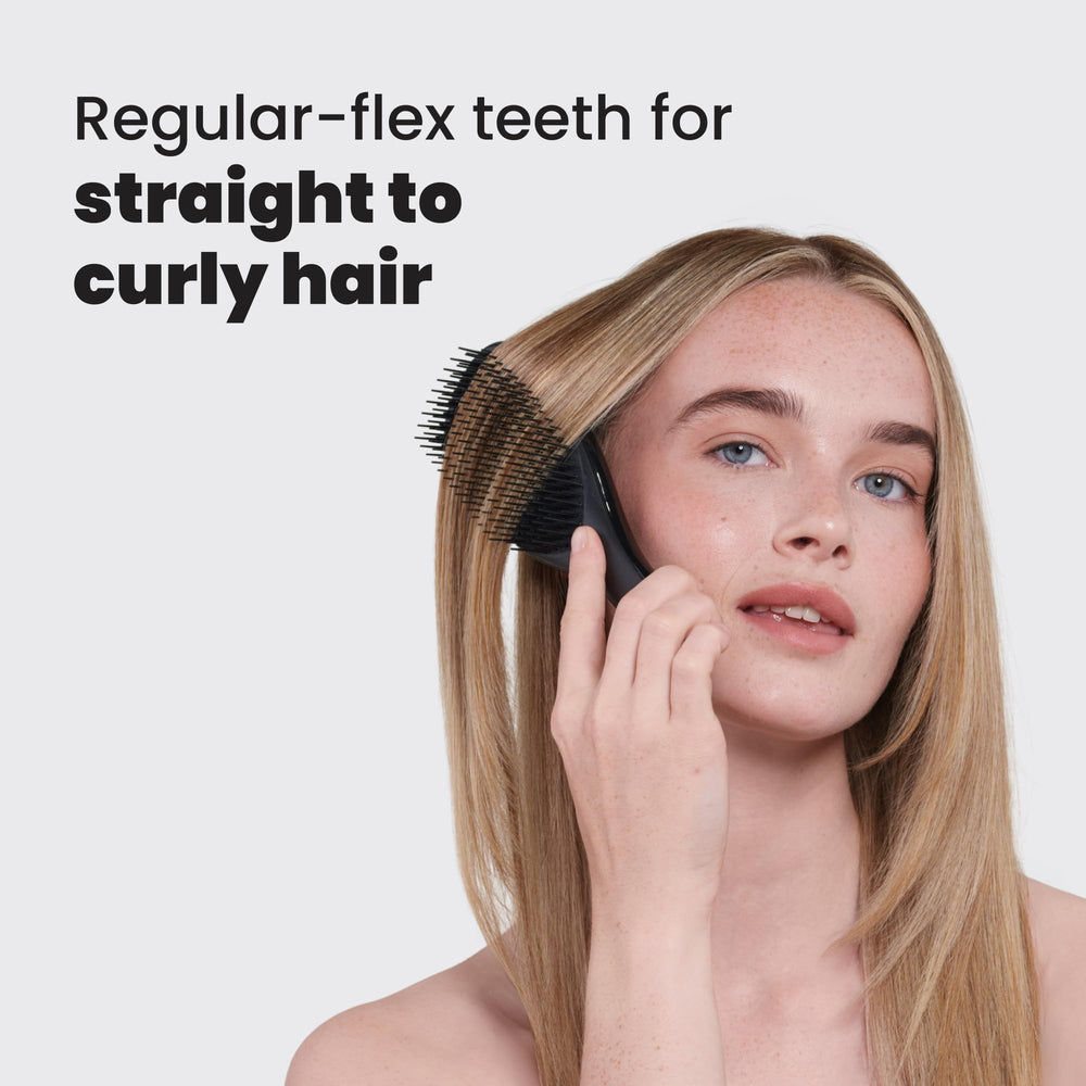 Tangle Teezer Ultimate Detangler in shower use for even product distribution.