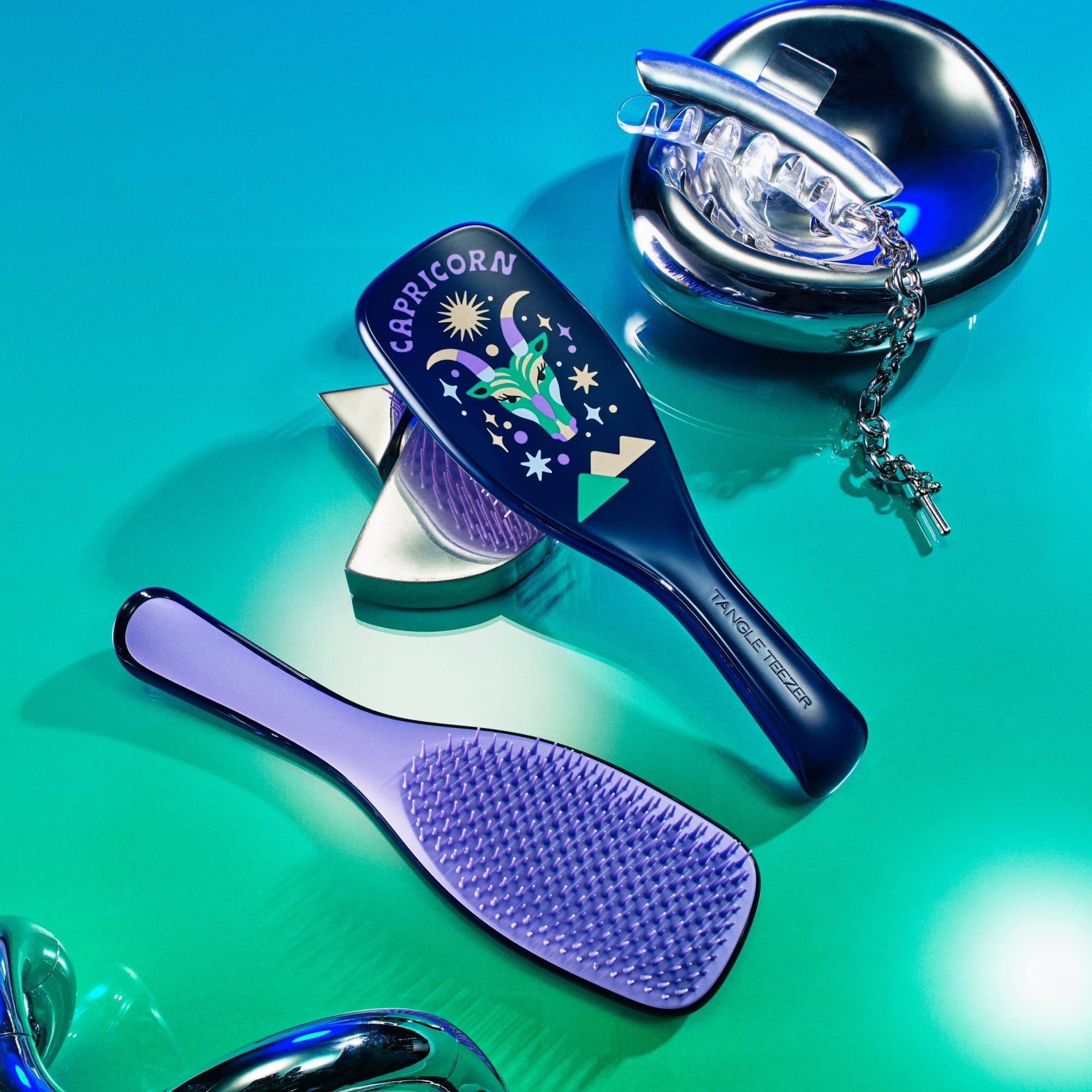 Tangle Teezer Zodiac Capricorn ergonomic handle designed for comfortable styling sessions.
