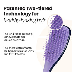 Tangle Teezer Zodiac Taurus regular-flex teeth smoothing strands during detangling.