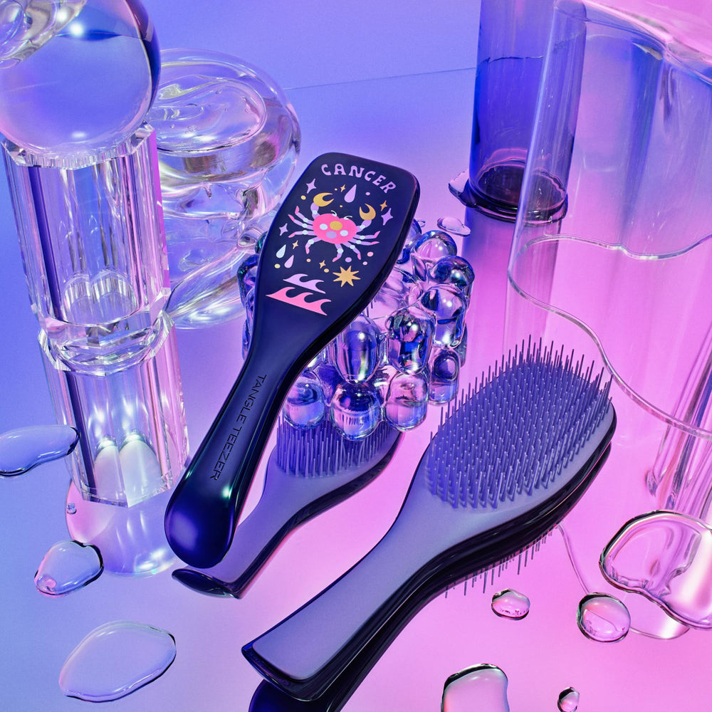 Tangle Teezer Zodiac detangler in shower assisting conditioning treatment distribution.