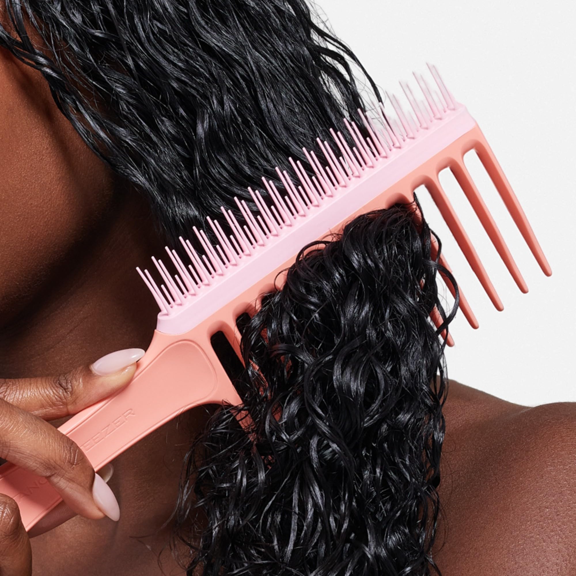 Tangle Teezer dual-sided design in use for detangling and conditioner distribution