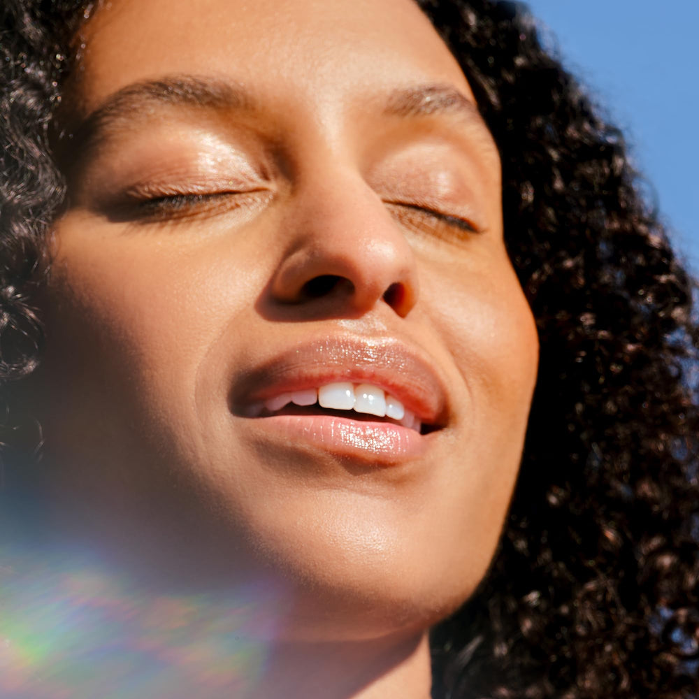 Glow routine shot with Tata Harper Resurfacing Mask suggesting spa-like results