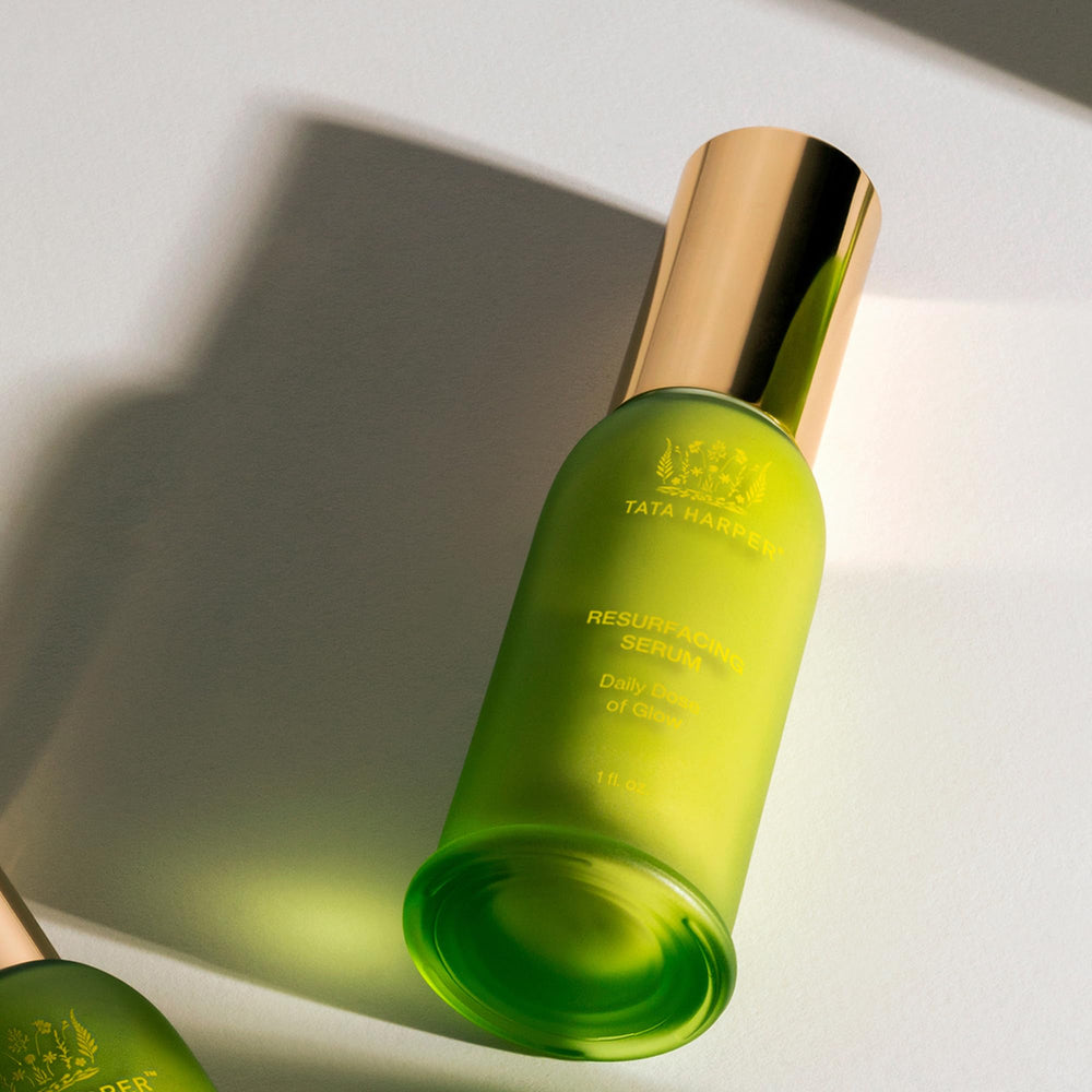 Tata Harper Resurfacing Serum texture droplets on skin surface
