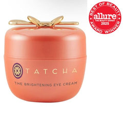 TATCHA Brightening Eye Cream tube closeup highlights smooth, easy-to-apply texture
