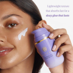 TATCHA The Dewy Milk Moisturizer pump dispensing creamy formula for oil balance and hydration.