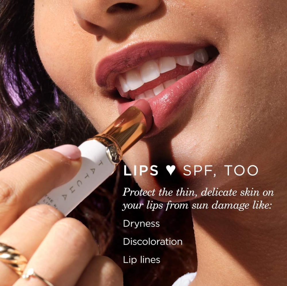 TATCHA Kissu Lip Tint Plum Blossom applied for smooth color on lips.