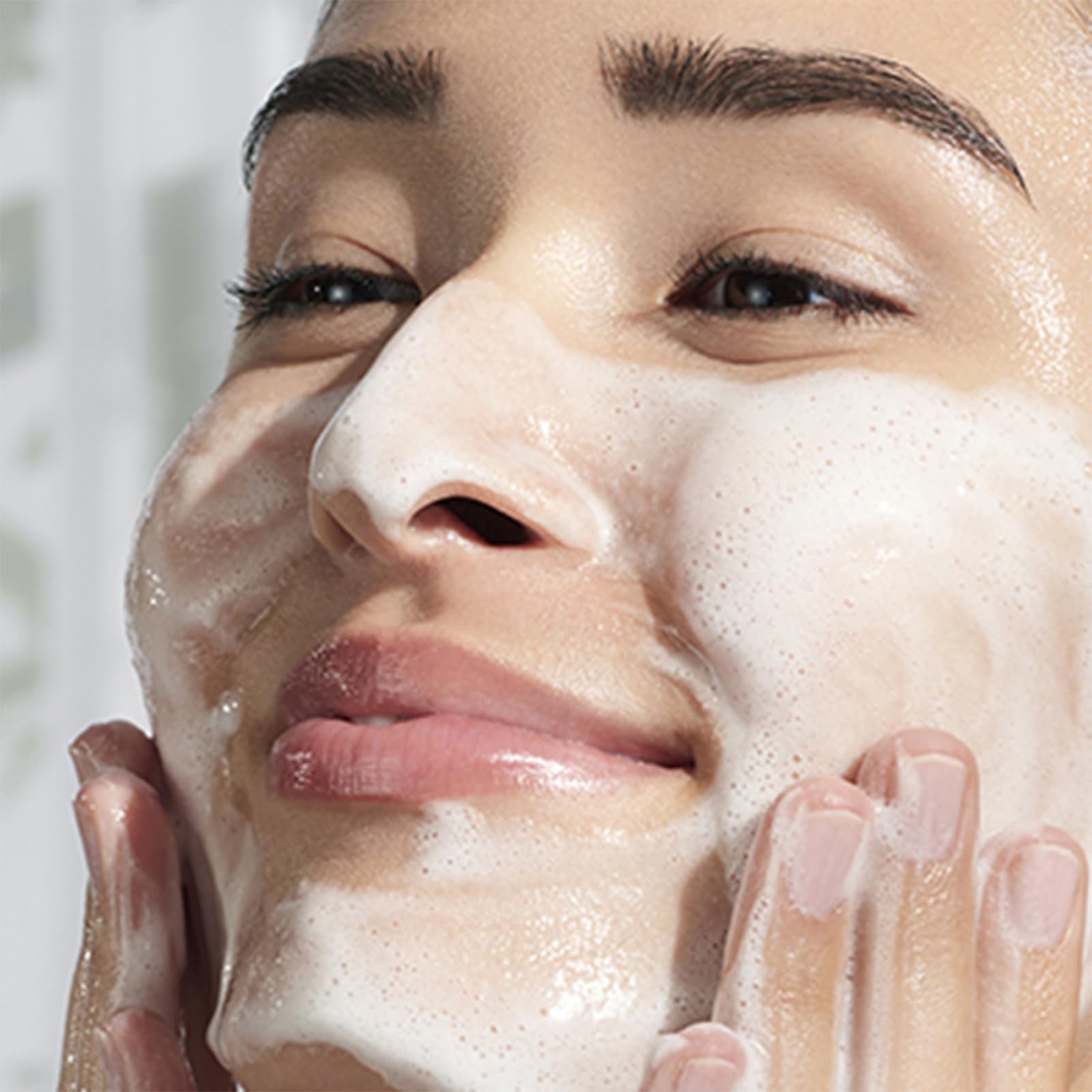 Tatcha Rice Polish Calming close-up shows creamy foam for sensitive skin care.