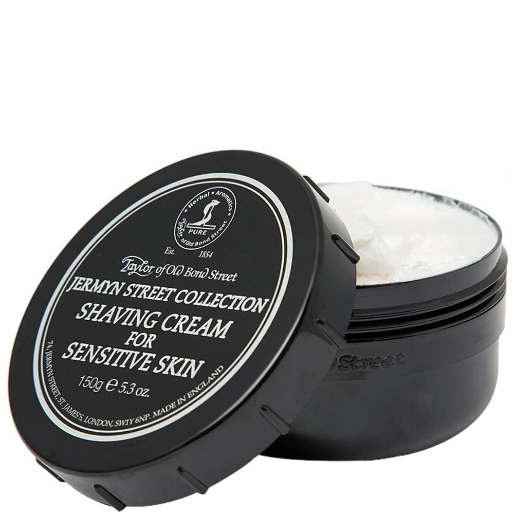 Taylor of Old Bond Street shaving cream shown with brush, highlighting its sensitive-skin friendly formula