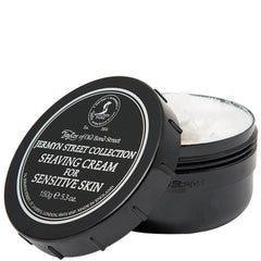 Taylor of Old Bond Street shaving cream shown with brush, highlighting its sensitive-skin friendly formula