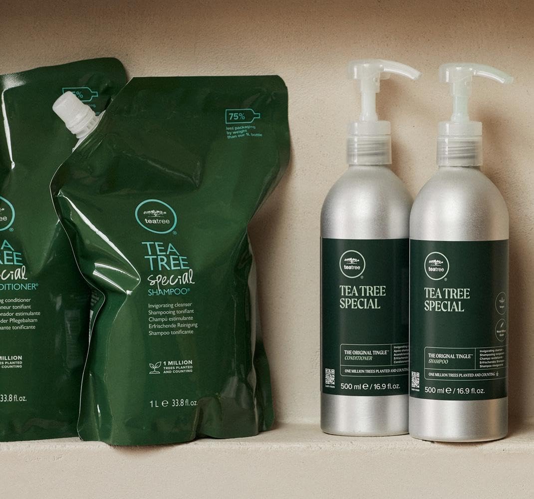 In-shower Tea Tree conditioner routine for quick manageability.