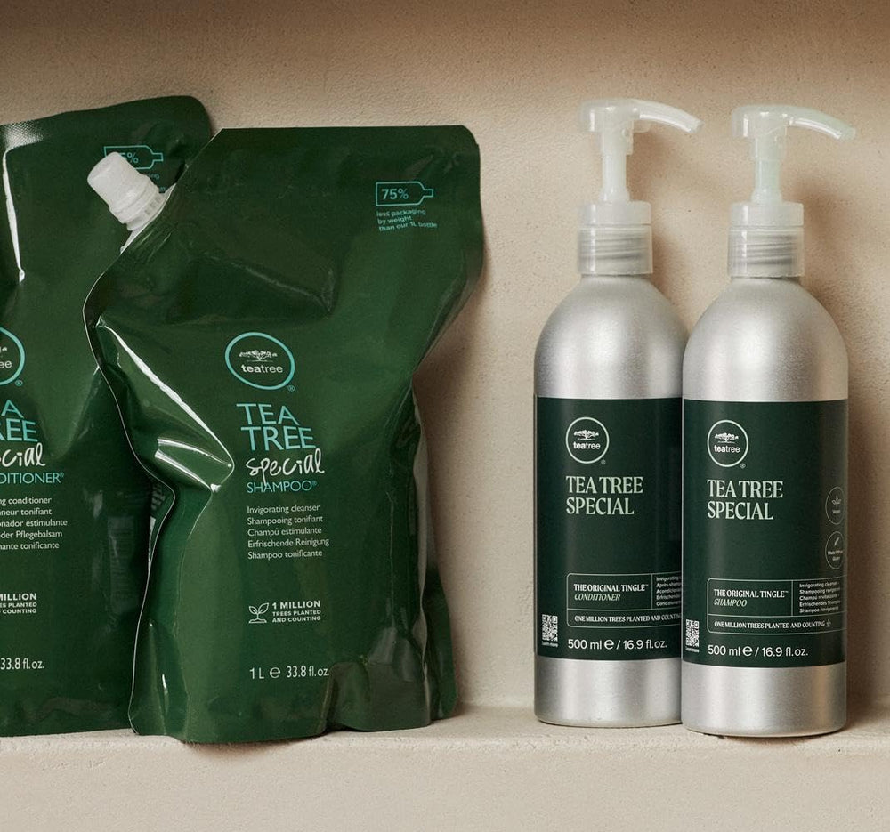 In-shower Tea Tree conditioner routine for quick manageability.