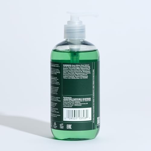 Tea Tree Hand Soap used on hands under water for cleansing routine.