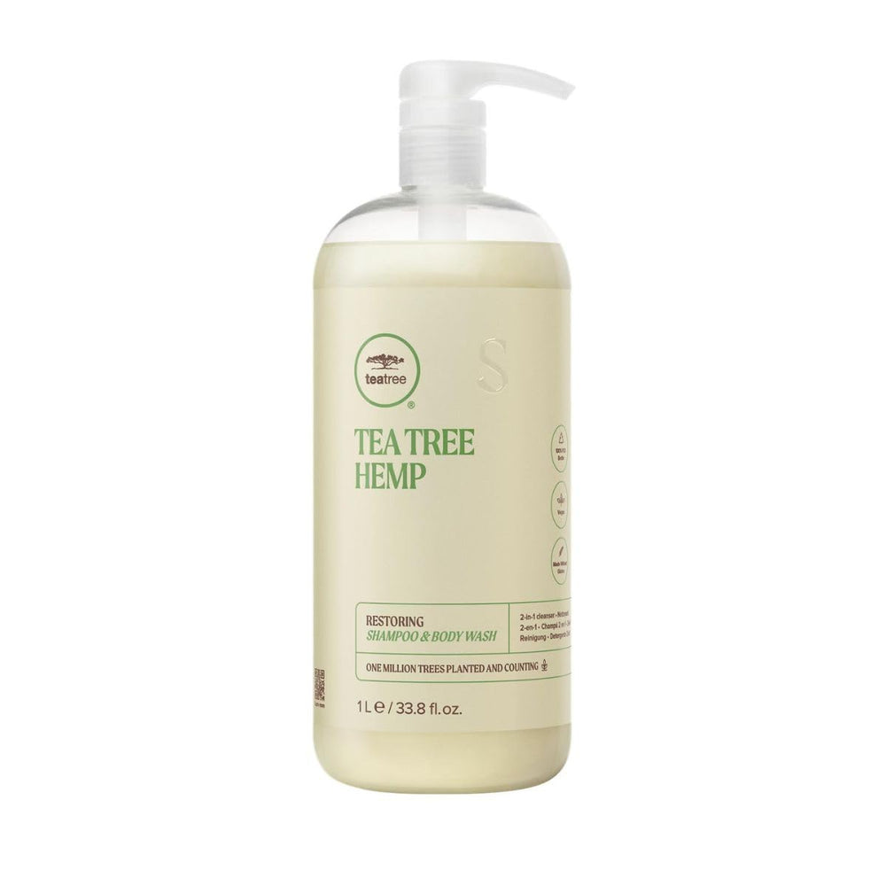 Tea Tree Hemp Restoring Shampoo bottle-front shows a hemp-infused cleanse for all hair types.