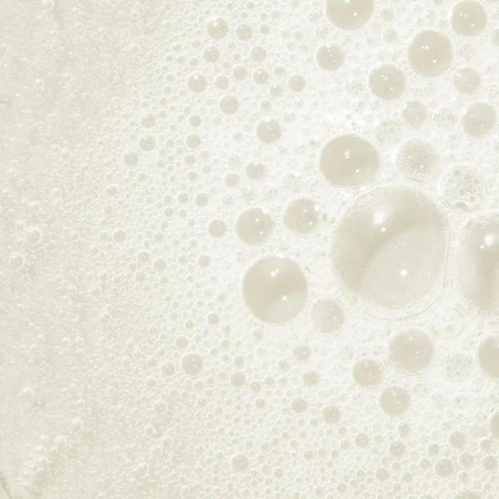 Tea Tree Hemp Restoring Shampoo used on hands and body for gentle cleansing.