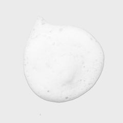 Tea Tree Lavender Mint Curl Refresh Foam texture close-up showing curl definition