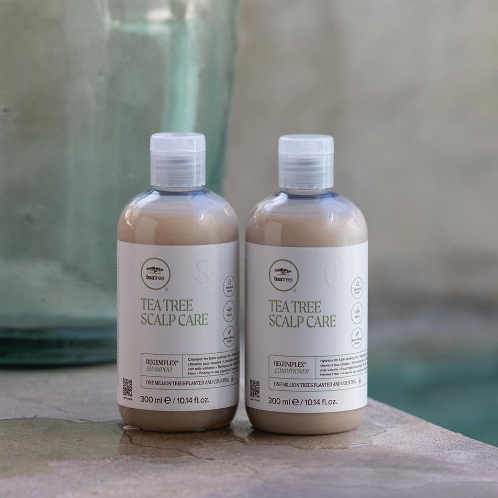 Tea Tree Regeniplex hair-application view demonstrates easy distribution on wet strands.