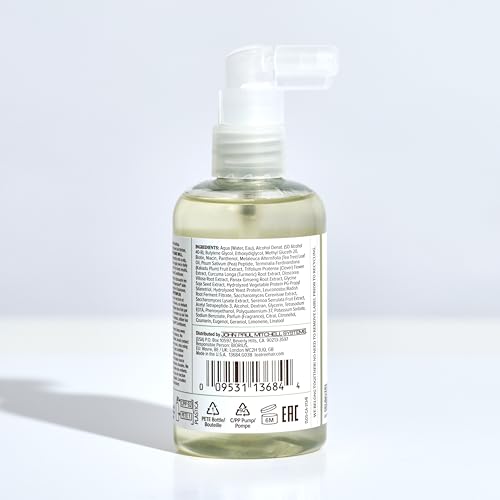 Tea Tree Regeniplex tonic bottle-label closeup highlights natural botanical blend.