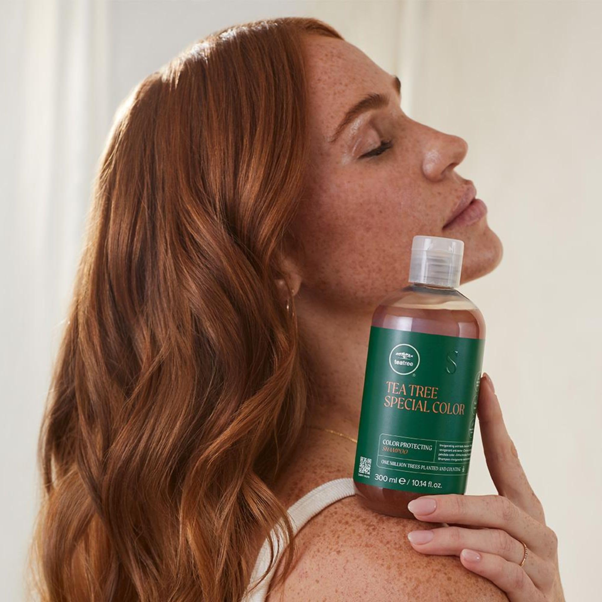 Tea Tree Special Color Shampoo bottle highlighting peppermint tingling experience