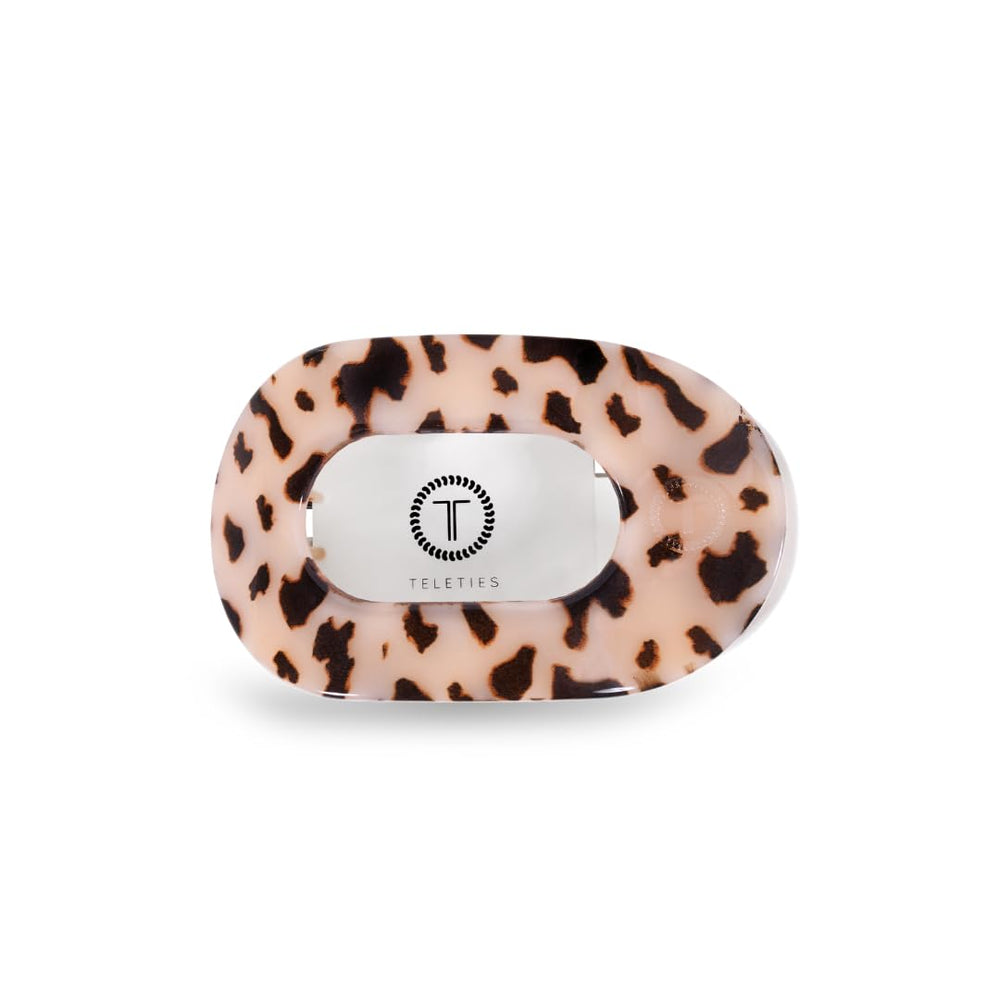 Teleties large flat round clip lying-down use demonstrates secure, comfortable hair support.