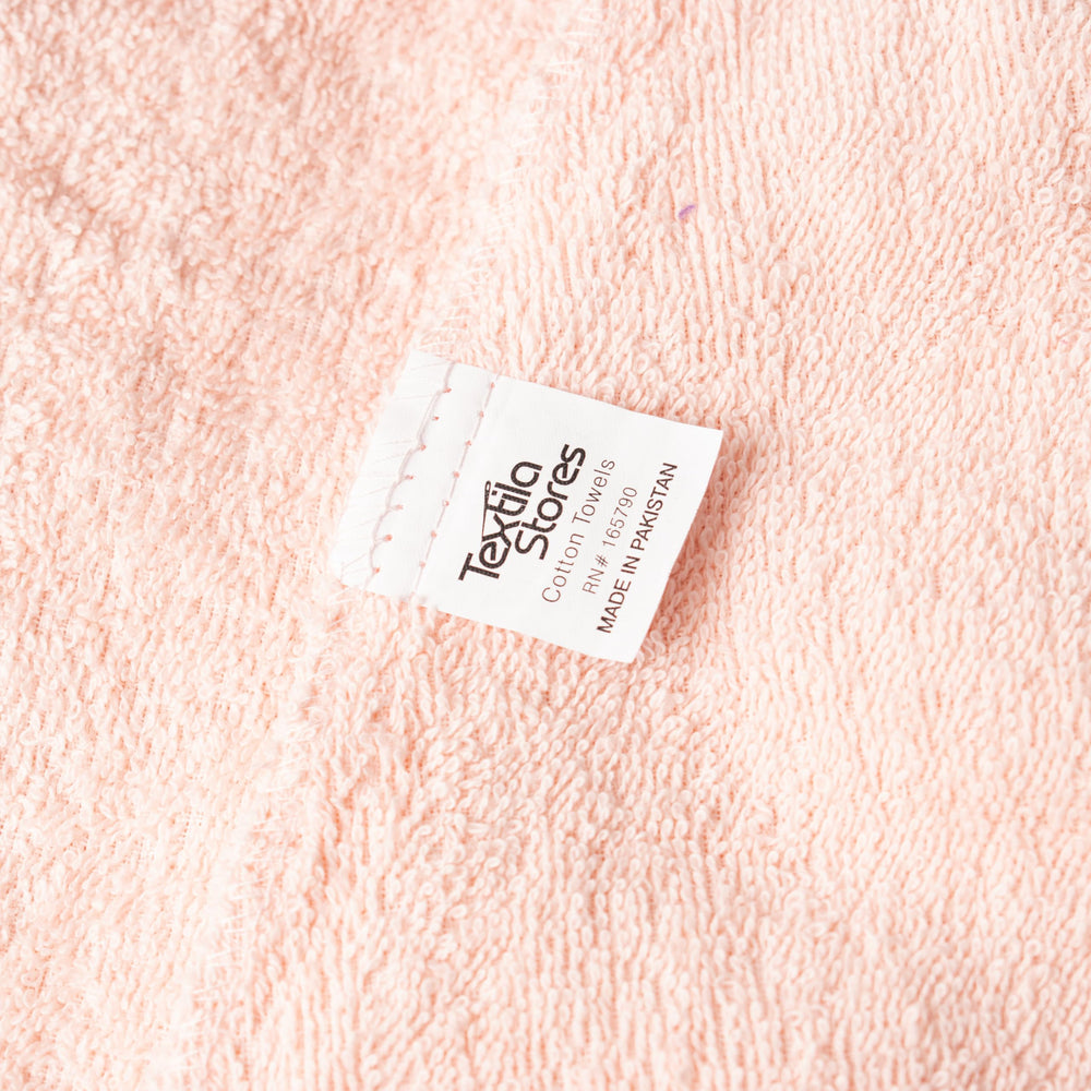 Textila hair wrap towel on frizz-prone hair for reduced rubbing