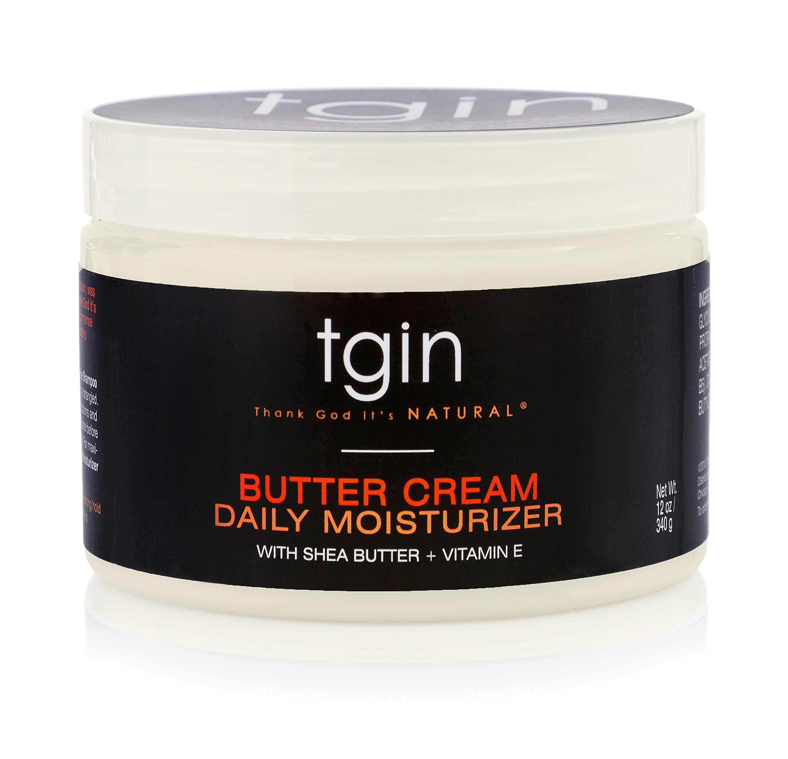tgin Butter Cream Daily Moisturizer being applied to dry curly hair for softness.