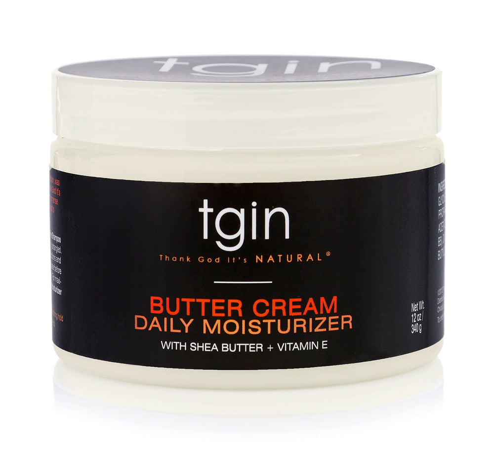 tgin Butter Cream Daily Moisturizer being applied to dry curly hair for softness.