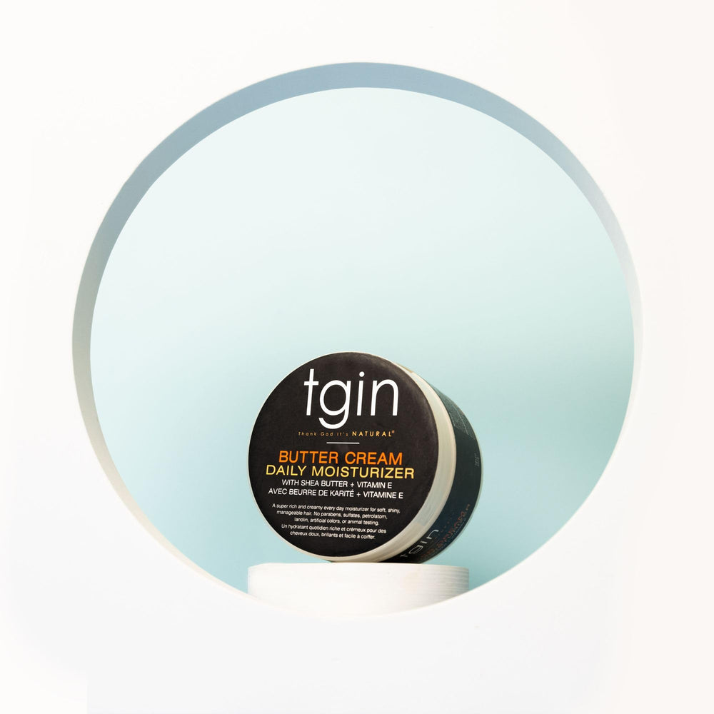 tgin curly-coily-wavy hair model demonstrates product-friendly styling.