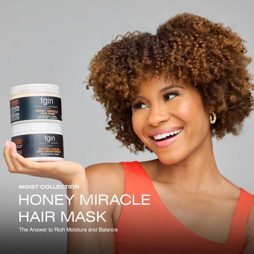 tgin Honey Miracle Hair Mask application on hands demonstrates detangling slip