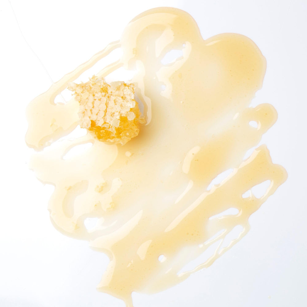TGIN Honey Miracle Hair Mask under heat capped for deeper conditioning