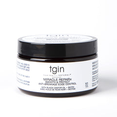TGIN Miracle RepaiRx edge control tube image applying for lasting shine.