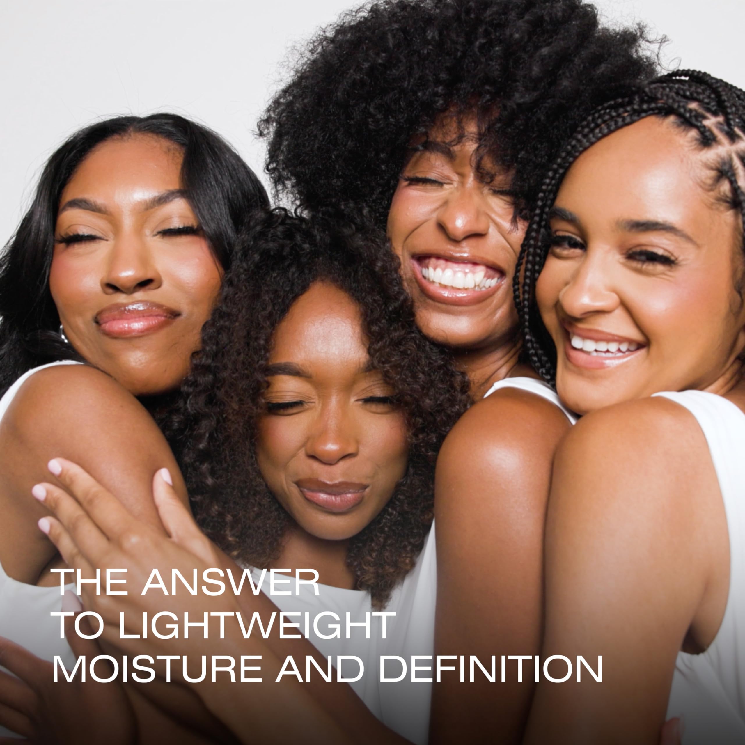 tgin Rose Water Frizz-Free conditioner on a bathroom shelf reducing frizz.