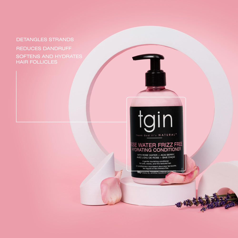 tgin Rose Water conditioner being applied to curls for easy detangling.