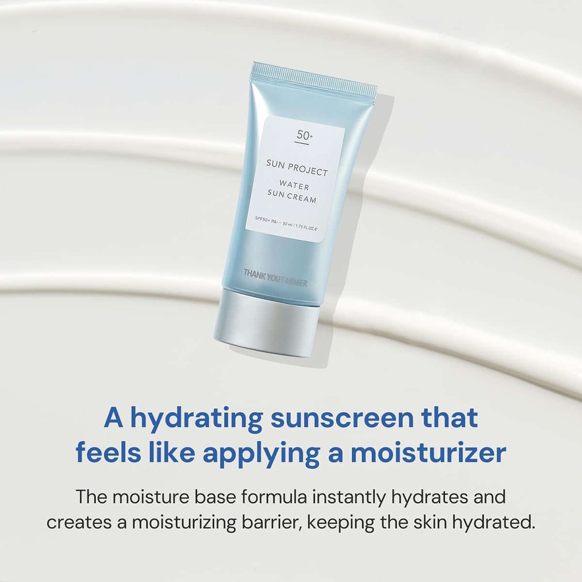 THANKYOU FARMER Sun Project Water Sun Cream water-splash shot highlights refreshing feel.