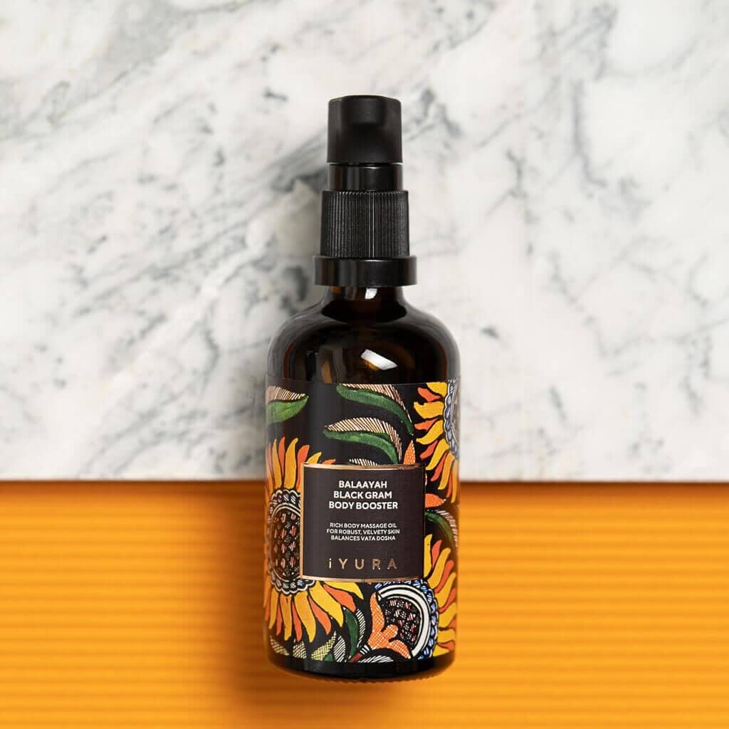 iYURA Balaayah oil being poured, showcasing smooth, quick absorption.