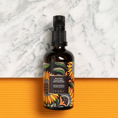iYURA Balaayah oil being poured, showcasing smooth, quick absorption.