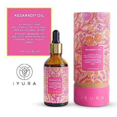 The Ayurveda Experience iYURA Kesaradi amber bottle close-up shows authentic ingredients